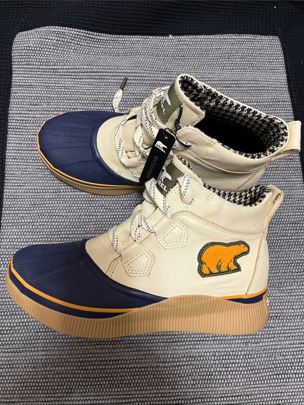 Sorel Duck Boots in Navy and Cream with Tan Trim